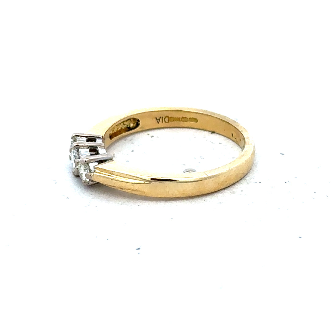 18ct yellow gold diamond ring in size L1/2, featuring a sparkling diamond setting and a sleek, polished band.