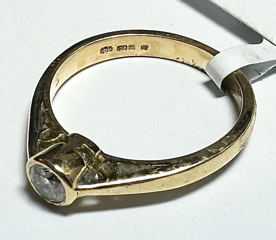 18ct yellow gold diamond ring size L1/2, featuring sparkling diamonds and a classic design, unbranded jewelry item.