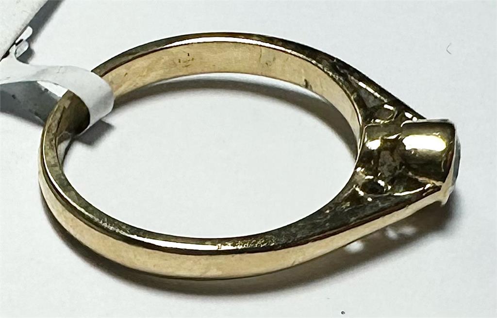 18ct yellow gold diamond ring size L1/2, unbranded, featuring a sparkling diamond set in a sleek gold band.