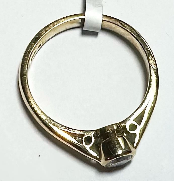 18ct yellow gold diamond ring in size L 1/2, featuring a sparkling diamond setting and elegant design.
