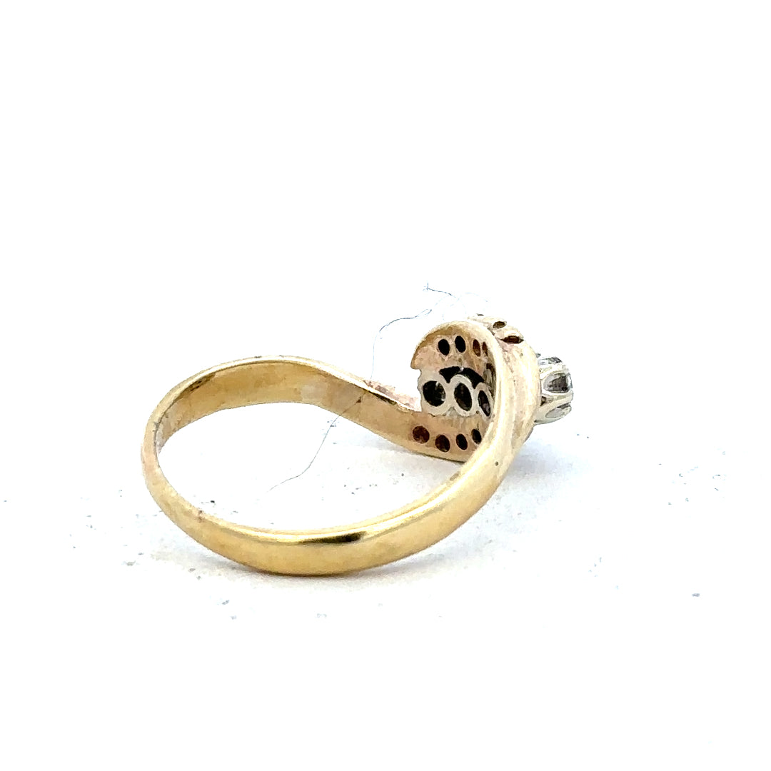 18ct yellow gold diamond ring in size M, featuring a sparkling diamond setting and a sleek, elegant band.