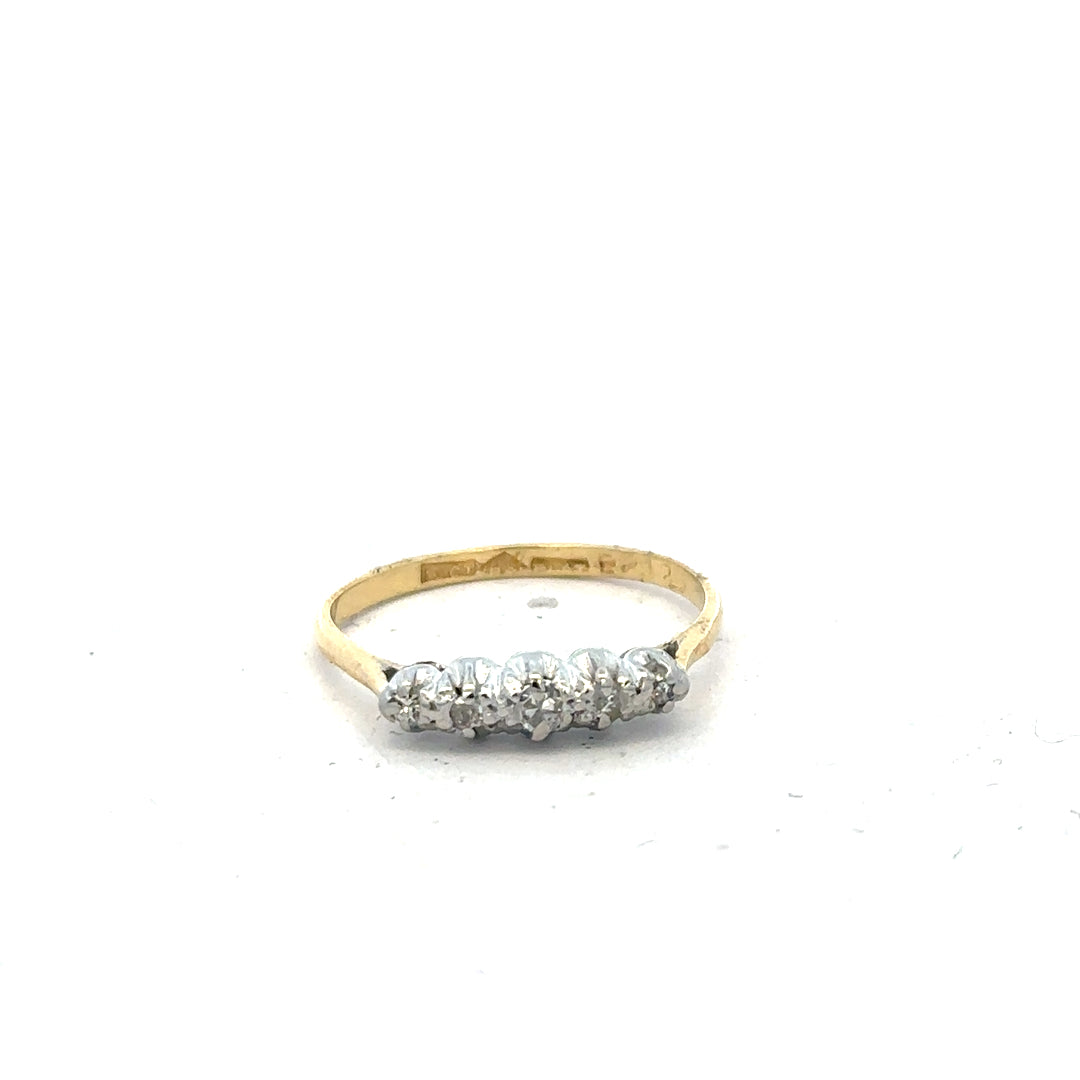 18ct yellow gold diamond ring in size N with sparkling diamonds, showcasing elegant jewelry craftsmanship.