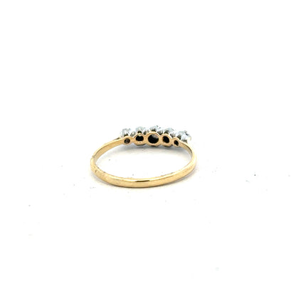 18ct yellow gold diamond ring in size N with sparkling diamonds, unbranded jewelry piece displayed on a white background.