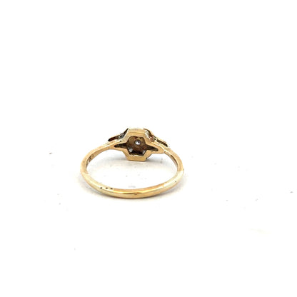 18ct yellow gold diamond ring in size N with a detailed close-up of sparkling diamonds and gold band.