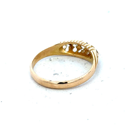 18ct yellow gold diamond ring in size P with a delicate design, weighing 3.1 grams.