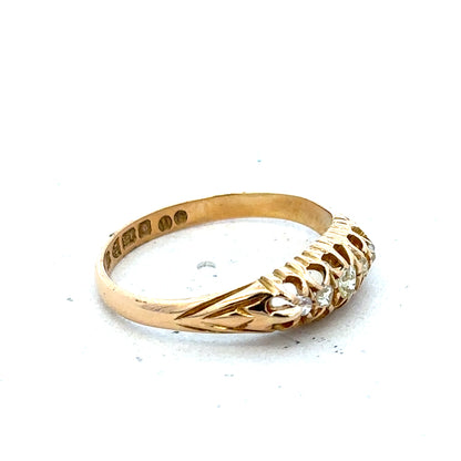 18ct yellow gold diamond ring in size P, featuring sparkling diamonds and weighing 3.1 grams.