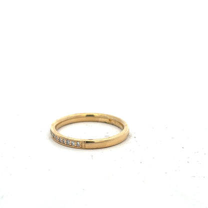 18ct yellow gold diamond ring in size P with sparkling diamonds, featuring a sleek and elegant design.