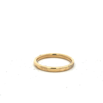 18ct yellow gold diamond ring in size P with sparkling diamonds, showcasing elegant craftsmanship and a classic design.