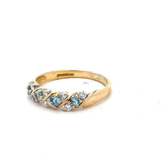 18ct yellow gold diamond ring size P with sparkling diamonds, unbranded jewelry piece displayed on a plain background.