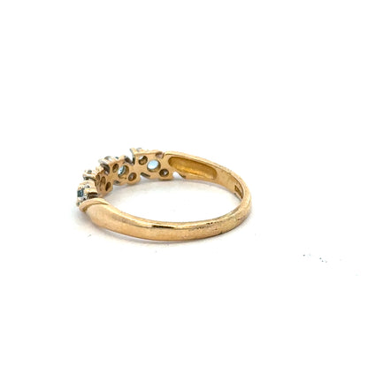 18ct yellow gold diamond ring in size P with sparkling diamonds, showcasing elegant jewelry design.