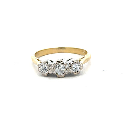 18ct yellow gold diamond ring in size P with sparkling diamonds, showcasing elegant jewelry craftsmanship.