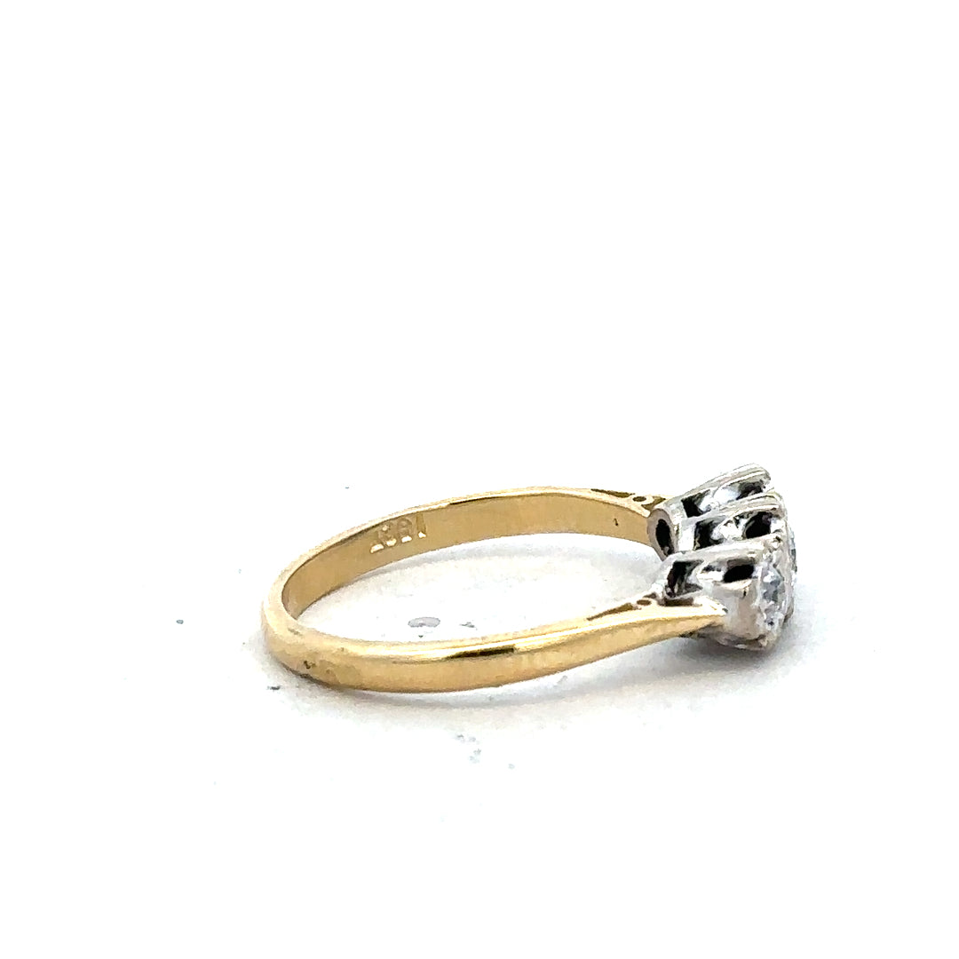 18ct yellow gold diamond ring in size P with sparkling diamonds, showcasing elegant craftsmanship and luxurious design.