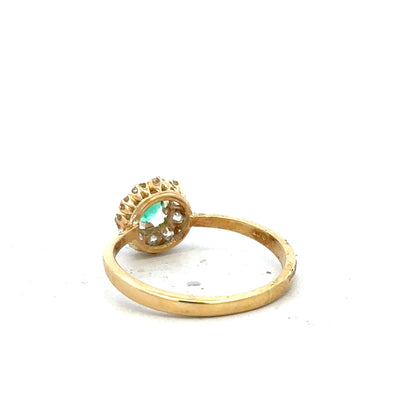 18ct yellow gold diamond ring, size P1/2, featuring a sparkling diamond set in a classic design.