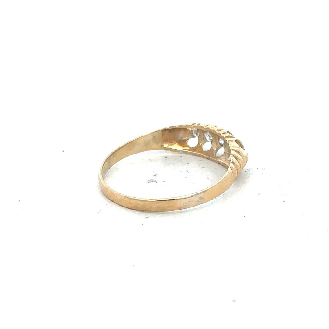 18ct yellow gold diamond ring in size S with sparkling diamonds, featuring a classic design and polished finish.