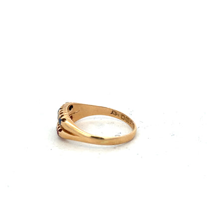 18ct yellow gold ring with diamonds, rubies, and sapphires, size P, showcasing colorful gemstone and gold jewelry design