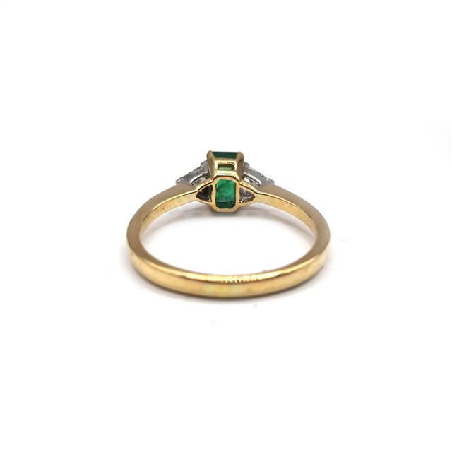 18ct yellow gold emerald and diamond ring with intricate design, showcasing vibrant green emeralds and sparkling diamonds.