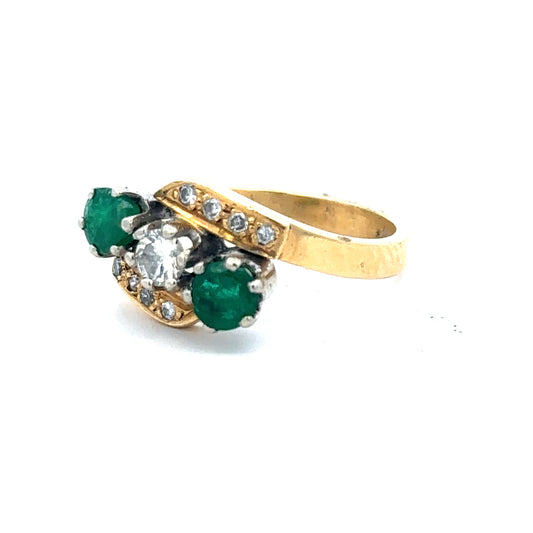 18ct yellow gold emerald and diamond ring, size N, showcasing a vibrant emerald centerpiece with sparkling diamonds.
