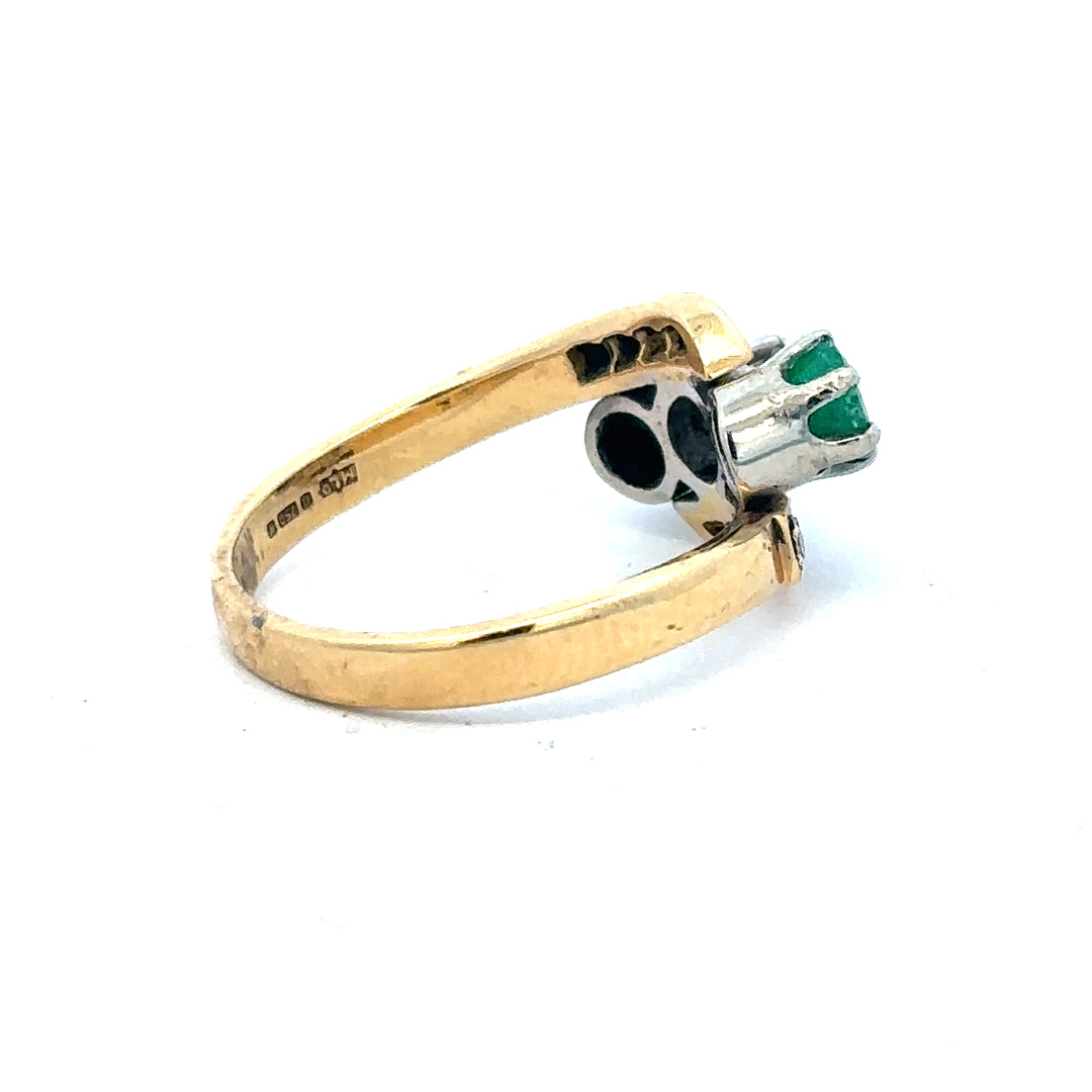 18ct yellow gold emerald and diamond ring, size N, featuring a central emerald with diamond accents, unbranded jewelry.