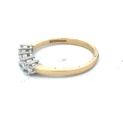 18ct yellow gold five-stone diamond ring with 1/2 carat total weight, featuring sparkling diamonds on a classic band.