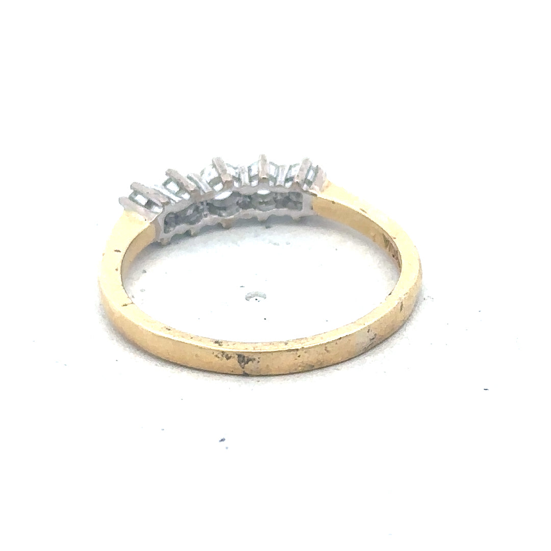 18ct yellow gold five-stone diamond ring with 1/2 carat total weight, showcasing sparkling diamonds on a sleek band.