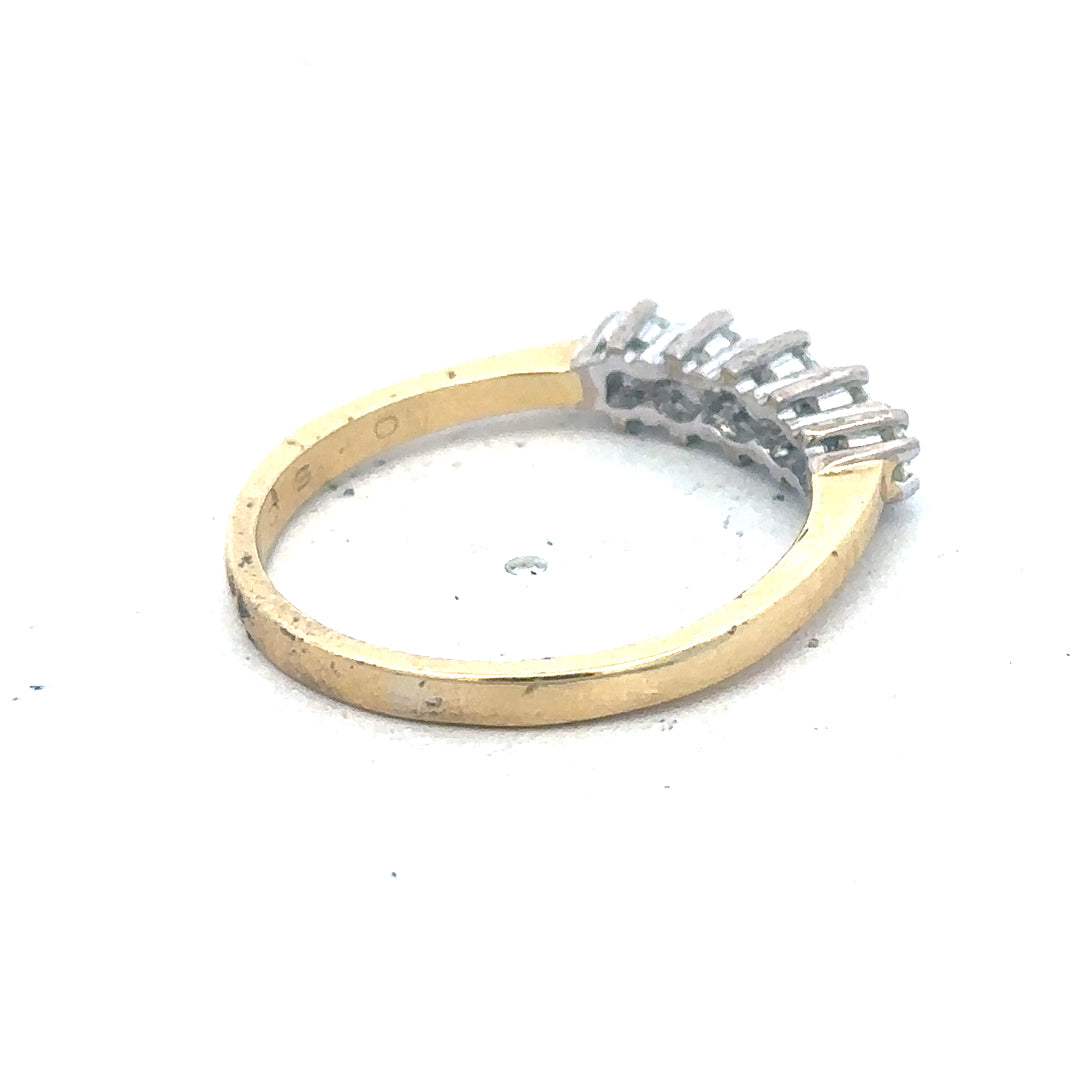 18ct yellow gold five-stone diamond ring with 1/2 carat total weight, featuring sparkling diamonds and a classic design.