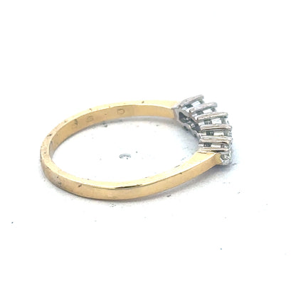18ct yellow gold five-stone diamond ring with 1/2 carat total weight, featuring sparkling diamonds on a sleek band.
