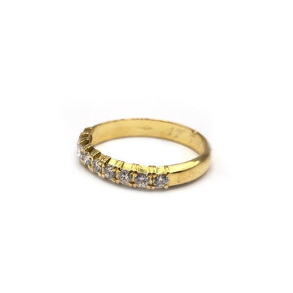 18ct yellow gold half eternity diamond ring with sparkling side stones, designed for elegant beauty and timeless style.
