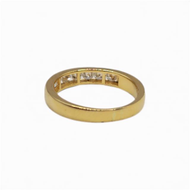 18ct yellow gold half eternity diamond ring with sparkling diamonds, unbranded, showcasing a sleek and elegant design.