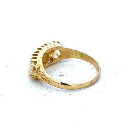 18ct yellow gold opal and diamond ring in size M, featuring a vibrant opal centerpiece with sparkling diamonds.