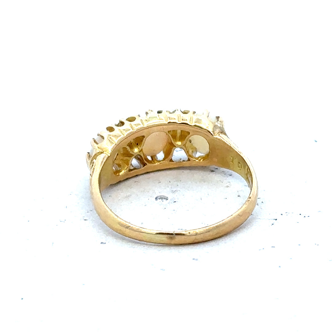 18ct yellow gold opal and diamond ring in size M, featuring a vibrant opal centerpiece and sparkling diamonds.