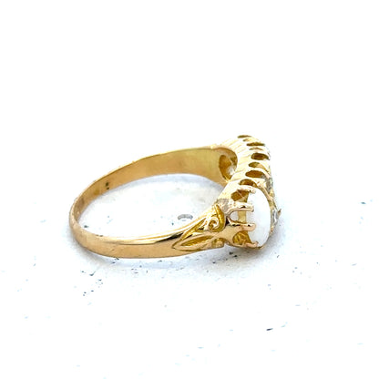 18ct yellow gold opal and diamond ring in size M, featuring a vibrant opal centerpiece and sparkling diamonds on a sleek band.