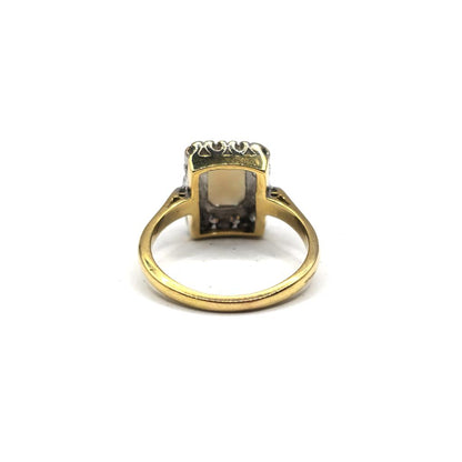 18ct yellow gold opal and diamond ring in size N1/2, featuring a vibrant opal gemstone and sparkling diamonds.