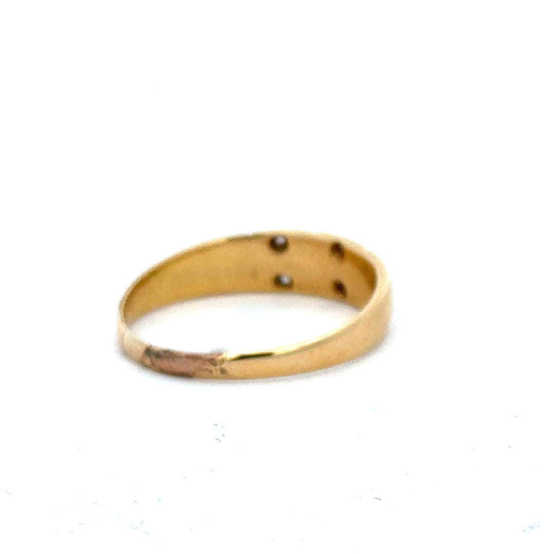 18ct yellow gold ring in size P1/2 with a smooth, polished band, unbranded jewelry piece.
