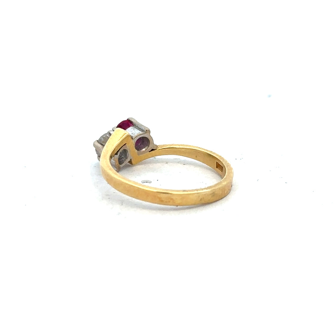 18ct yellow gold ruby and diamond ring in size L, featuring vibrant rubies and sparkling diamonds in a elegant jewelry design.