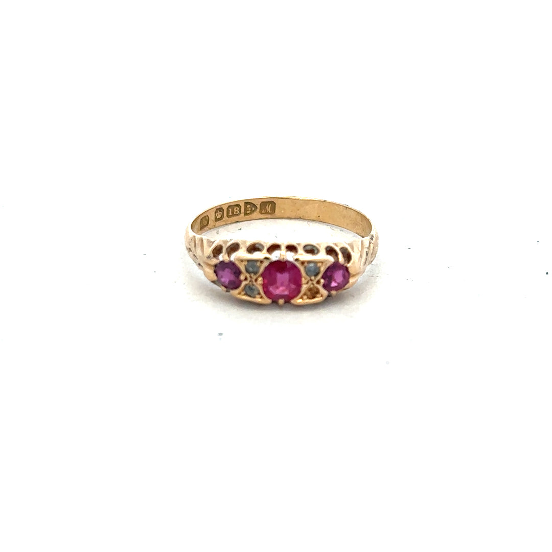 18ct yellow gold ruby and diamond ring in size P, featuring a detailed design with sparkling gemstones.