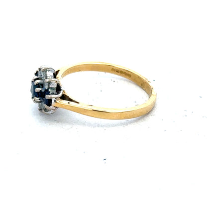 18ct yellow gold sapphire and diamond ring in size K, featuring a sparkling gemstone centerpiece and elegant gold band.