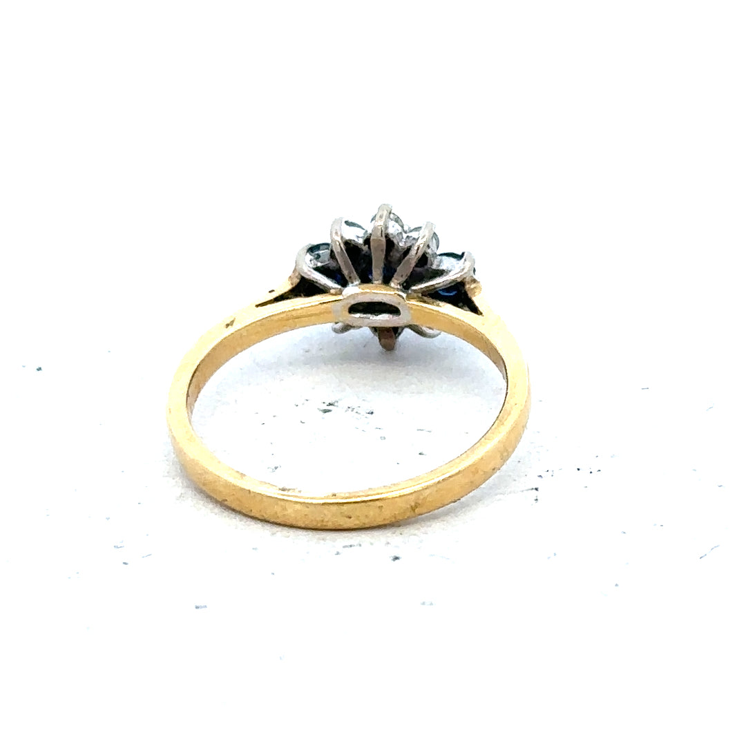 18ct yellow gold sapphire and diamond ring, size K, featuring a vibrant sapphire centerpiece and sparkling diamonds.