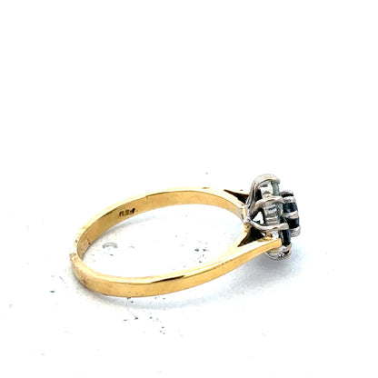 18ct yellow gold sapphire and diamond ring, size K, featuring a central sapphire gemstone with diamond accents.