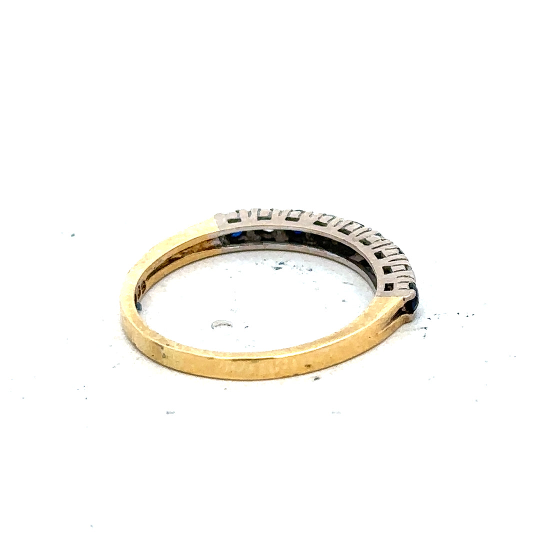 18ct yellow gold sapphire and diamond ring in size L1/2, featuring a central blue sapphire with diamond accents.