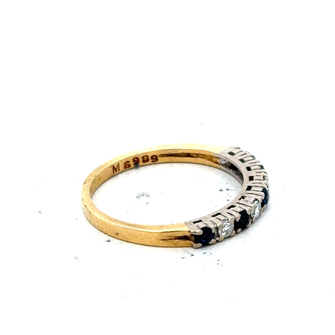 18ct yellow gold sapphire and diamond ring in size L 1/2, featuring a sparkling gemstone design.