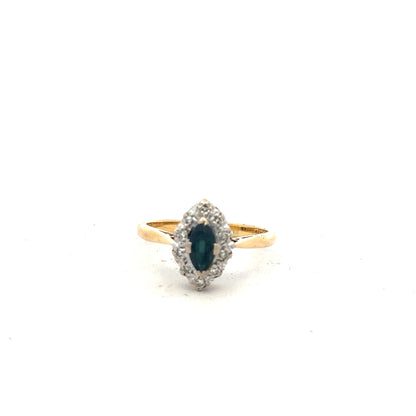 18ct yellow gold sapphire and diamond ring, size M, featuring a vibrant blue sapphire and sparkling diamonds on a sleek band.