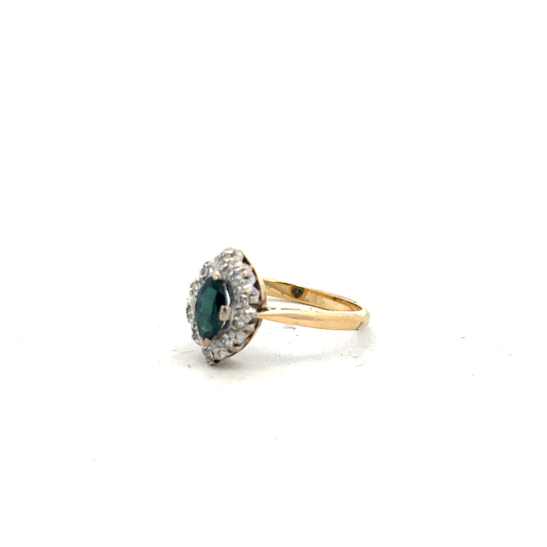 18ct yellow gold sapphire and diamond ring in size M, featuring a sparkling gemstone and elegant design.