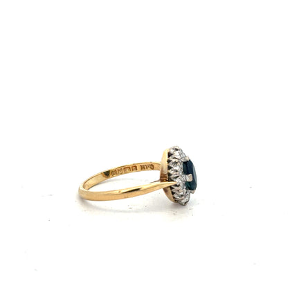 18ct yellow gold sapphire and diamond ring in size M, featuring a vibrant sapphire center and sparkling diamonds.