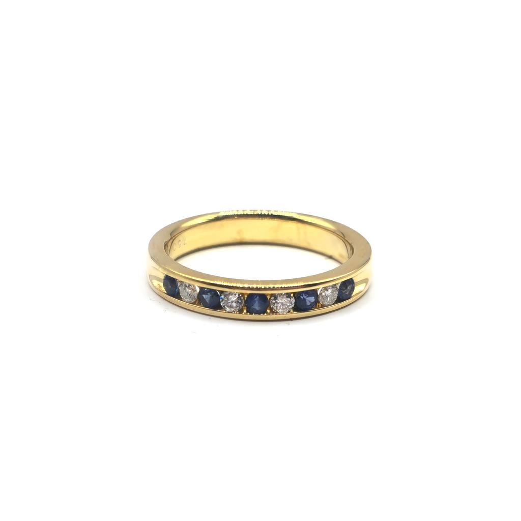 18ct yellow gold sapphire and diamond ring in size N, featuring a vibrant sapphire centerpiece and sparkling diamonds.