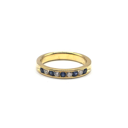 18ct yellow gold sapphire and diamond ring in size N, featuring a vibrant sapphire centerpiece and sparkling diamonds.