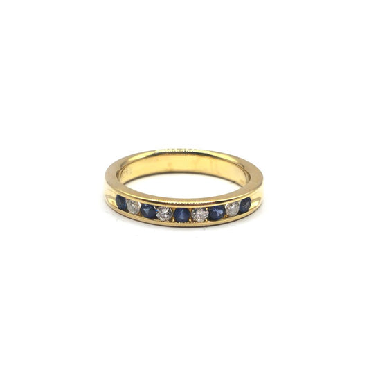 18ct yellow gold sapphire and diamond ring in size N, featuring a vibrant sapphire centerpiece and sparkling diamonds.