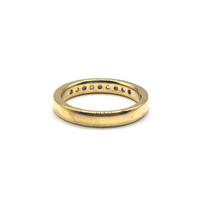 18ct yellow gold sapphire and diamond ring in size N, featuring a central sapphire and sparkling diamonds.