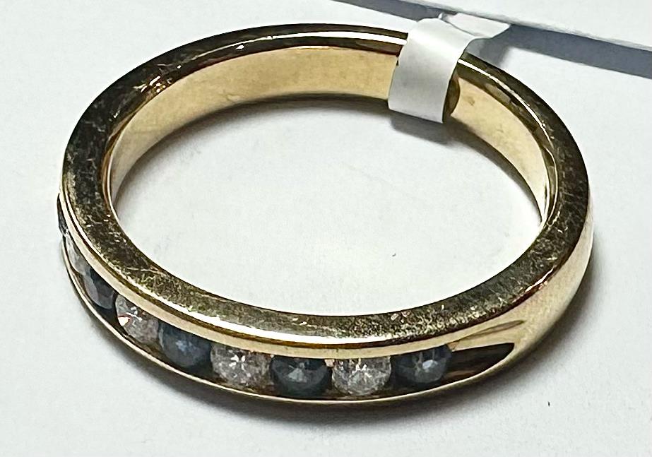 18ct yellow gold sapphire and diamond ring, size N, featuring a central sapphire gemstone with surrounding diamonds.