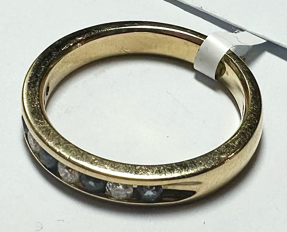 18ct yellow gold sapphire and diamond ring, size N, featuring a central sapphire surrounded by diamonds, unbranded jewelry.