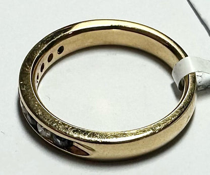 18ct yellow gold sapphire and diamond ring in size N, featuring a vibrant sapphire centerpiece with sparkling diamonds.
